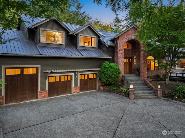 view of front of property with a garage