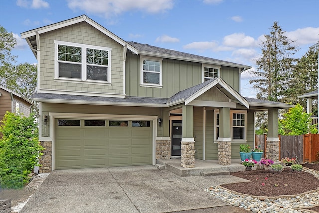 craftsman house with a garage