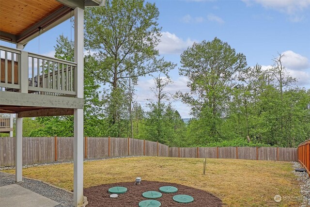 view of yard featuring a deck