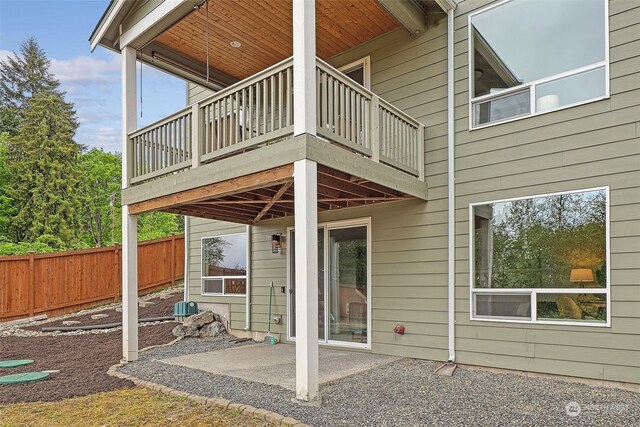 exterior space featuring a patio and a balcony