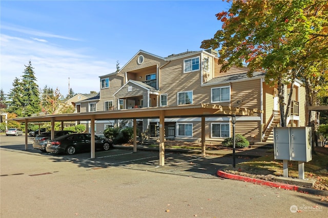 view of front facade featuring a carport