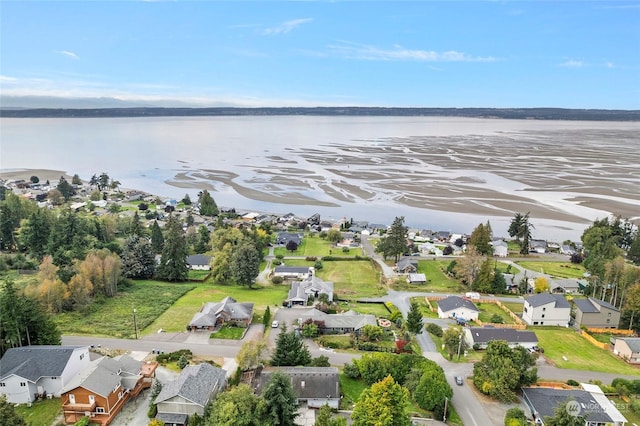 bird's eye view with a water view and a residential view