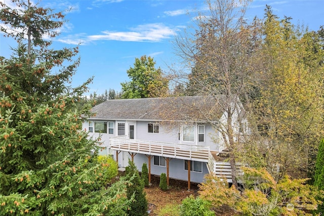 view of front of house with stairs