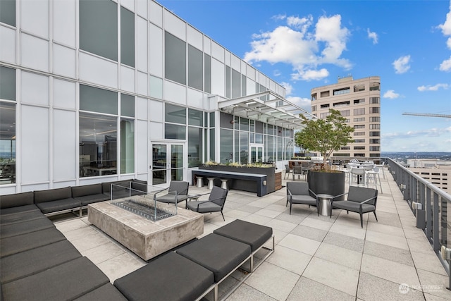 view of patio with a fire pit