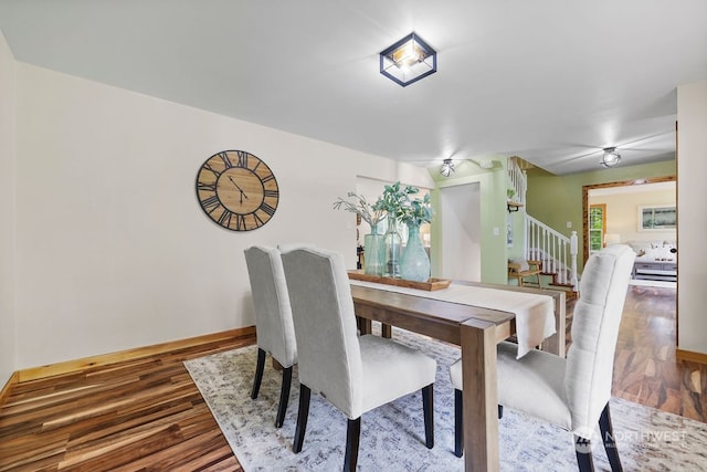 dining area featuring hardwood / wood-style floors