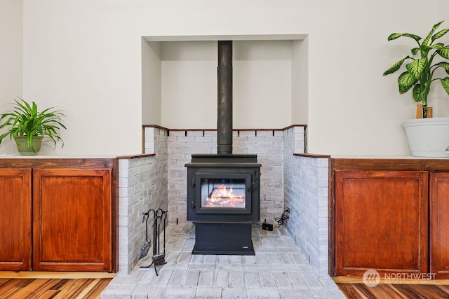 interior details featuring a wood stove