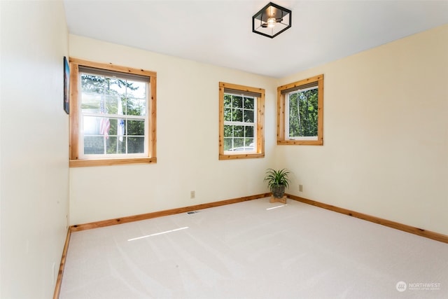 view of carpeted spare room