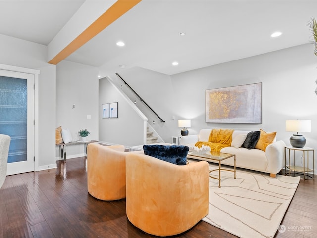 living room with dark hardwood / wood-style floors