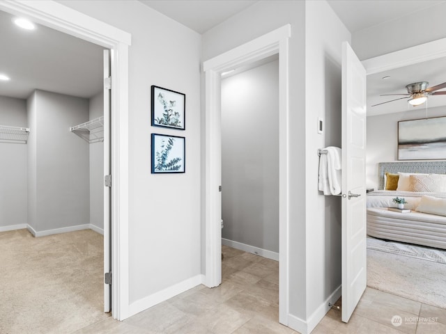 bathroom with ceiling fan