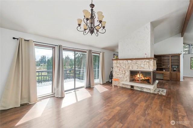 living room featuring an inviting chandelier, vaulted ceiling with beams, dark hardwood / wood-style floors, and a fireplace