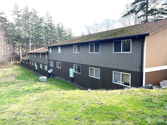 view of home's exterior featuring a yard