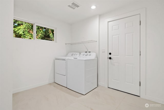 laundry room featuring independent washer and dryer