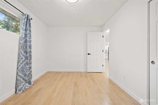 empty room featuring light hardwood / wood-style floors