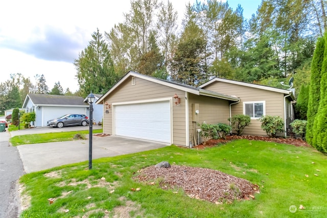 ranch-style home with a front yard and a garage