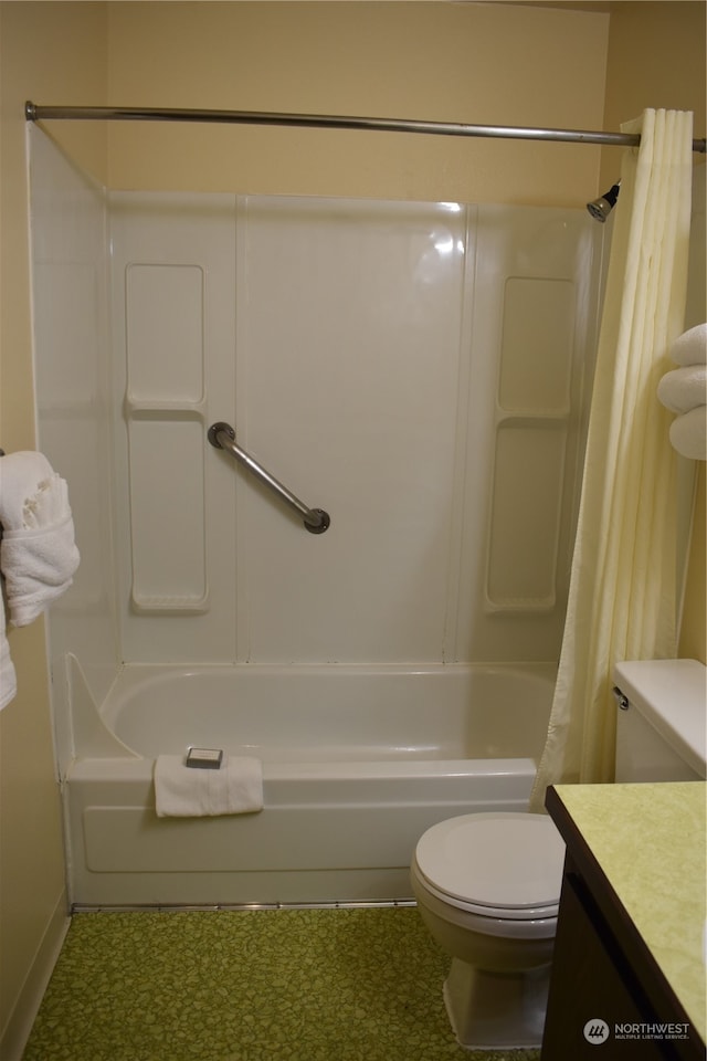 full bathroom with shower / bath combo, vanity, and toilet