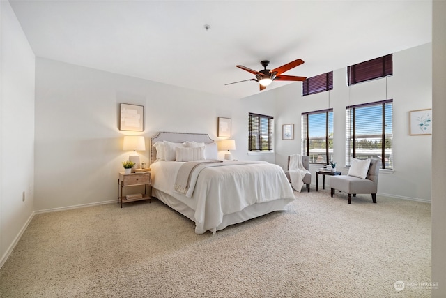 bedroom with ceiling fan and carpet flooring