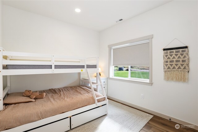 bedroom featuring hardwood / wood-style flooring