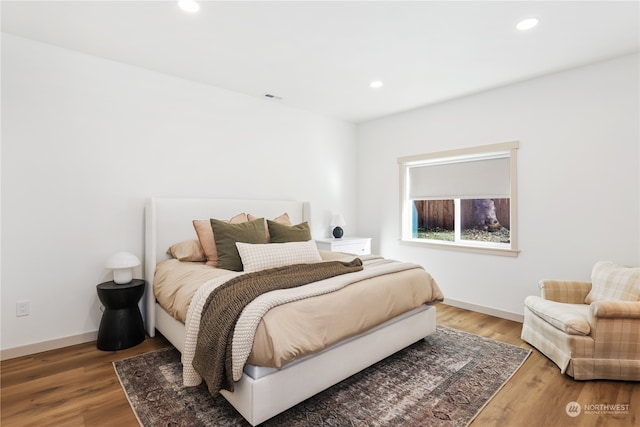 bedroom featuring hardwood / wood-style floors