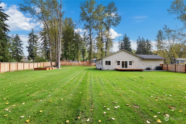 view of yard featuring a deck