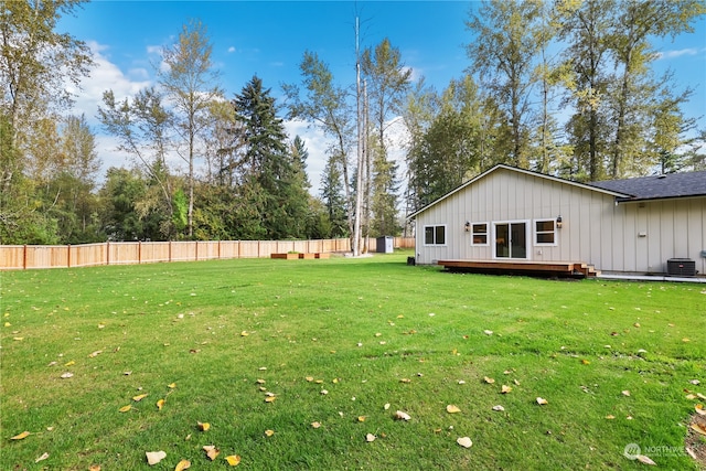 view of yard featuring central AC unit