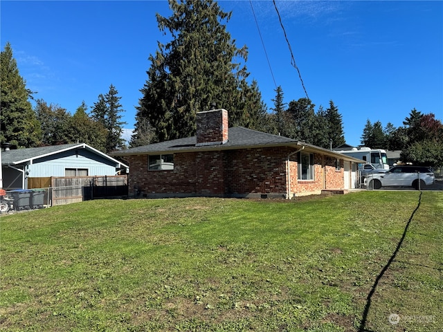 view of property exterior featuring a lawn