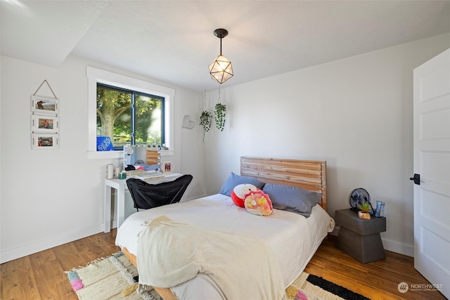 bedroom with light hardwood / wood-style flooring