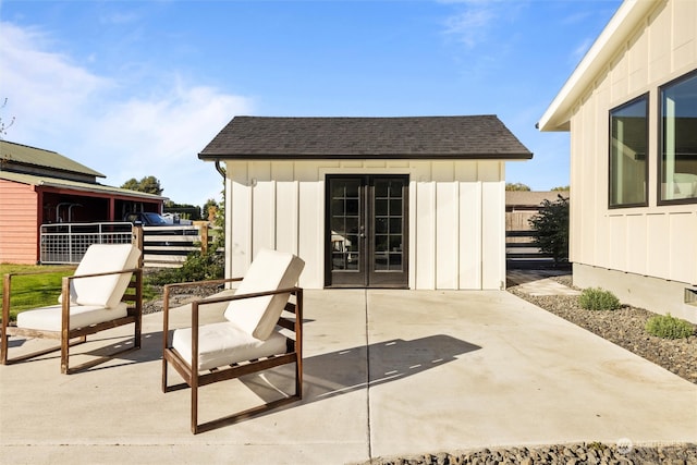 view of patio / terrace featuring an outbuilding