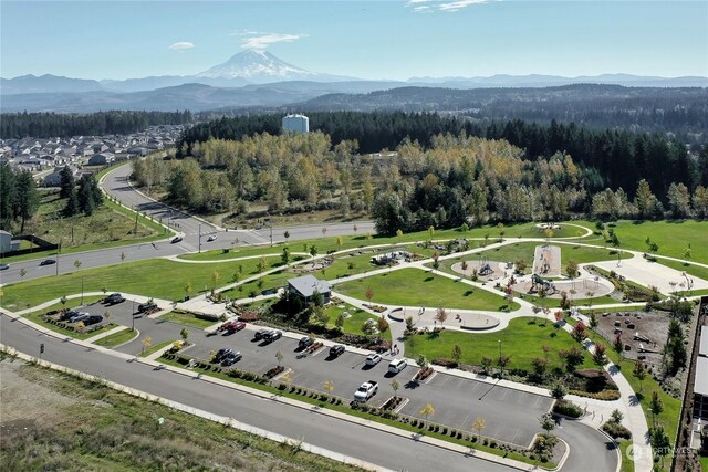 birds eye view of property featuring a mountain view