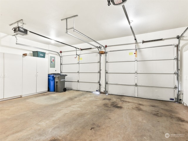 garage featuring a garage door opener