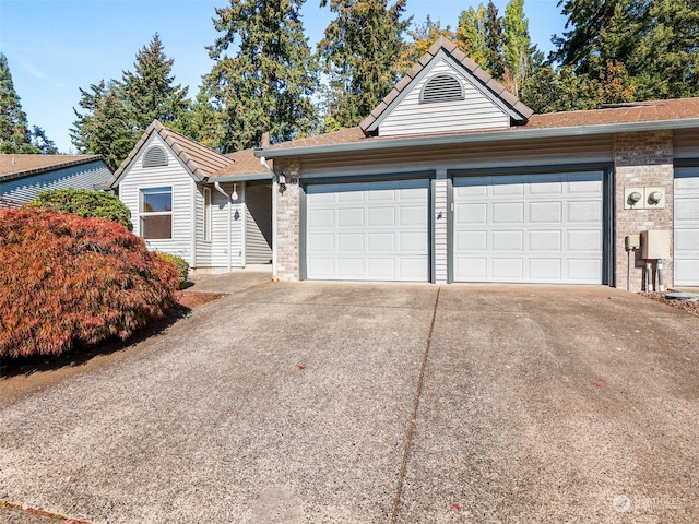 ranch-style house with a garage