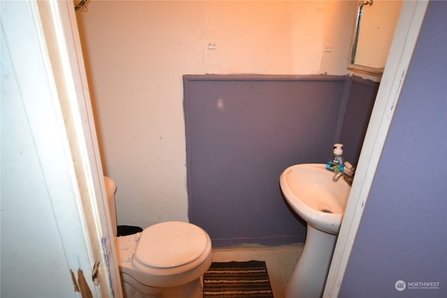 bathroom featuring toilet