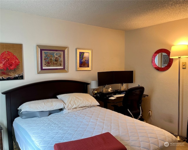 bedroom with a textured ceiling