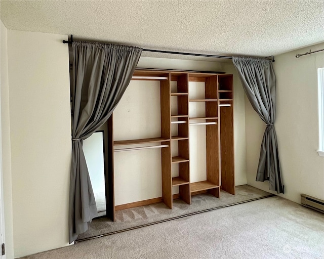 closet with a baseboard radiator