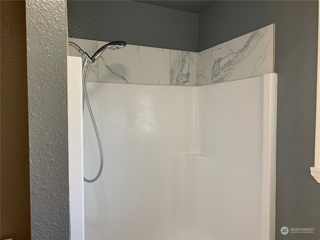 bathroom with a shower