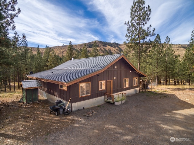 exterior space featuring a mountain view