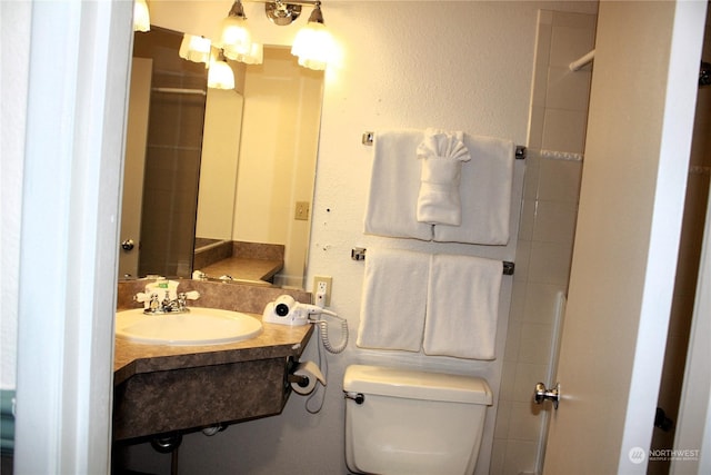 bathroom featuring a sink and toilet