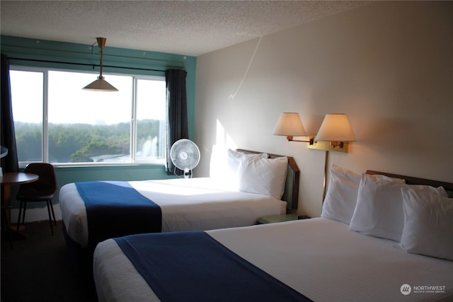 bedroom featuring a textured ceiling