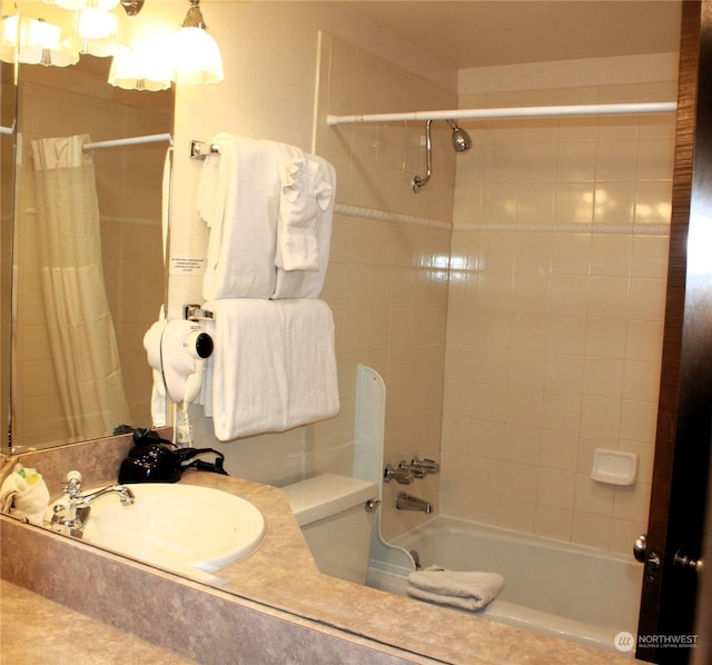 full bathroom with vanity, shower / bathtub combination with curtain, and toilet
