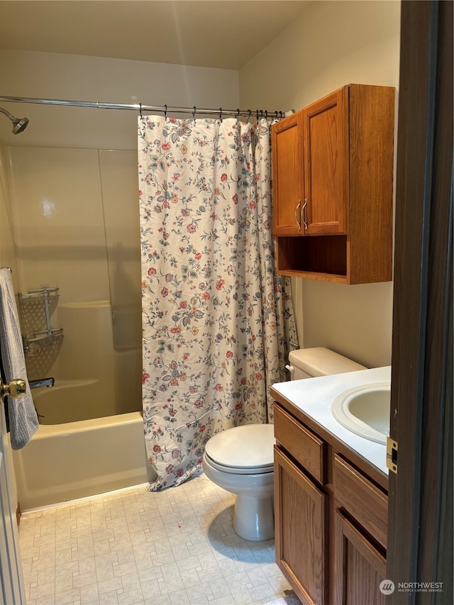 full bathroom with vanity, toilet, and shower / tub combo with curtain