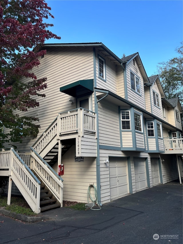 view of side of property featuring a garage