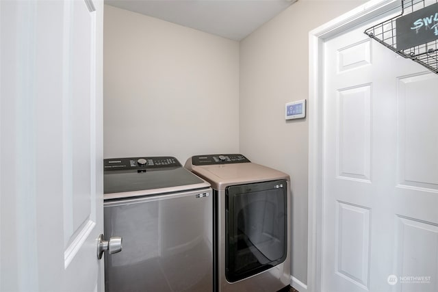 washroom featuring separate washer and dryer