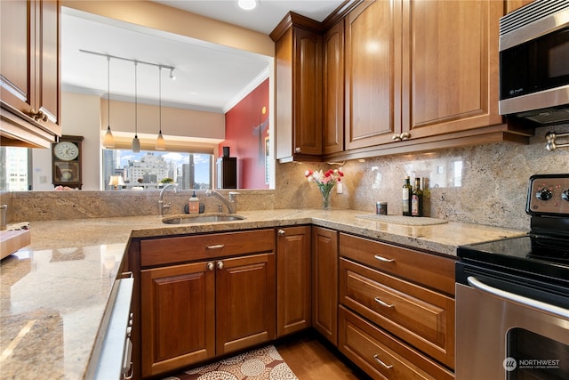 kitchen with tasteful backsplash, sink, appliances with stainless steel finishes, ornamental molding, and light stone countertops