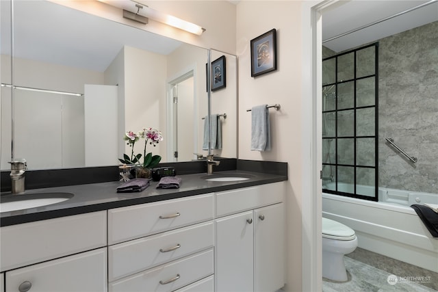 full bathroom with vanity, toilet, tile patterned floors, and bath / shower combo with glass door