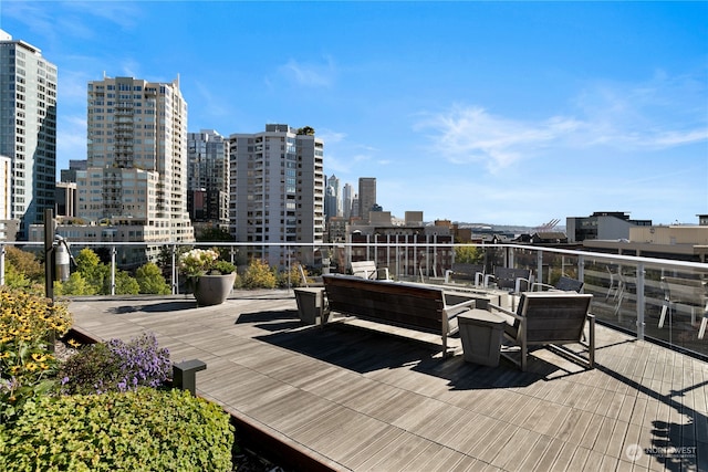 view of patio featuring a balcony