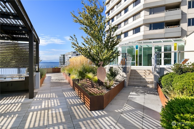 view of patio with a balcony