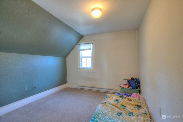 additional living space with a textured ceiling, carpet flooring, lofted ceiling, and a baseboard radiator