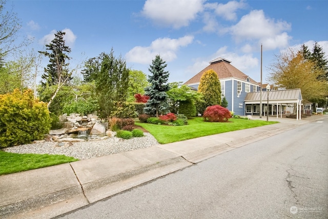 exterior space with a lawn