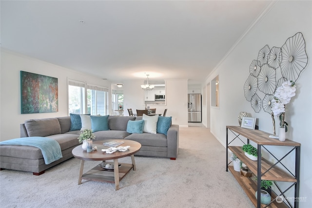 living room featuring crown molding, light colored carpet, and a chandelier