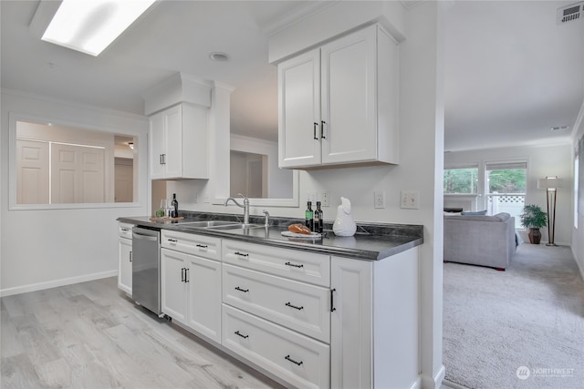 kitchen featuring light hardwood / wood-style flooring, sink, dishwasher, ornamental molding, and white cabinetry