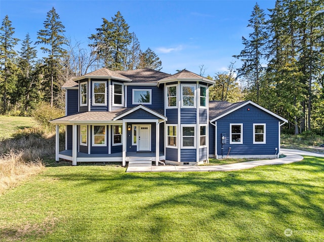 view of front facade featuring a porch and a front lawn